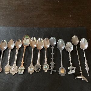 Vintage 13 piece souvenir spoon From all over the world.